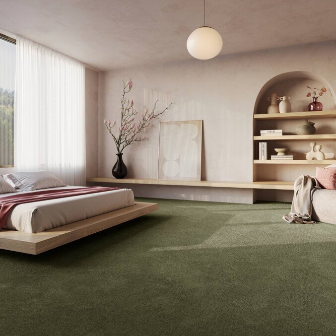Teppichboden als Rolle Raumfoto eines grünen Teppichbodens in Rollenform in einem Schlafzimmer
